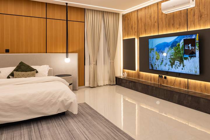 Bedroom with media wall