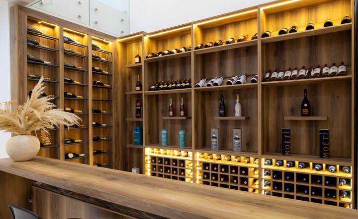 Bar and lit wine wall