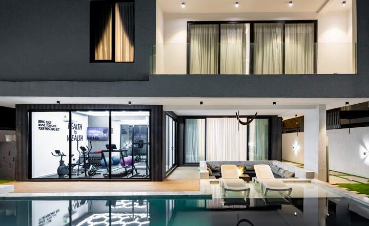 Pool terrace and gym at night